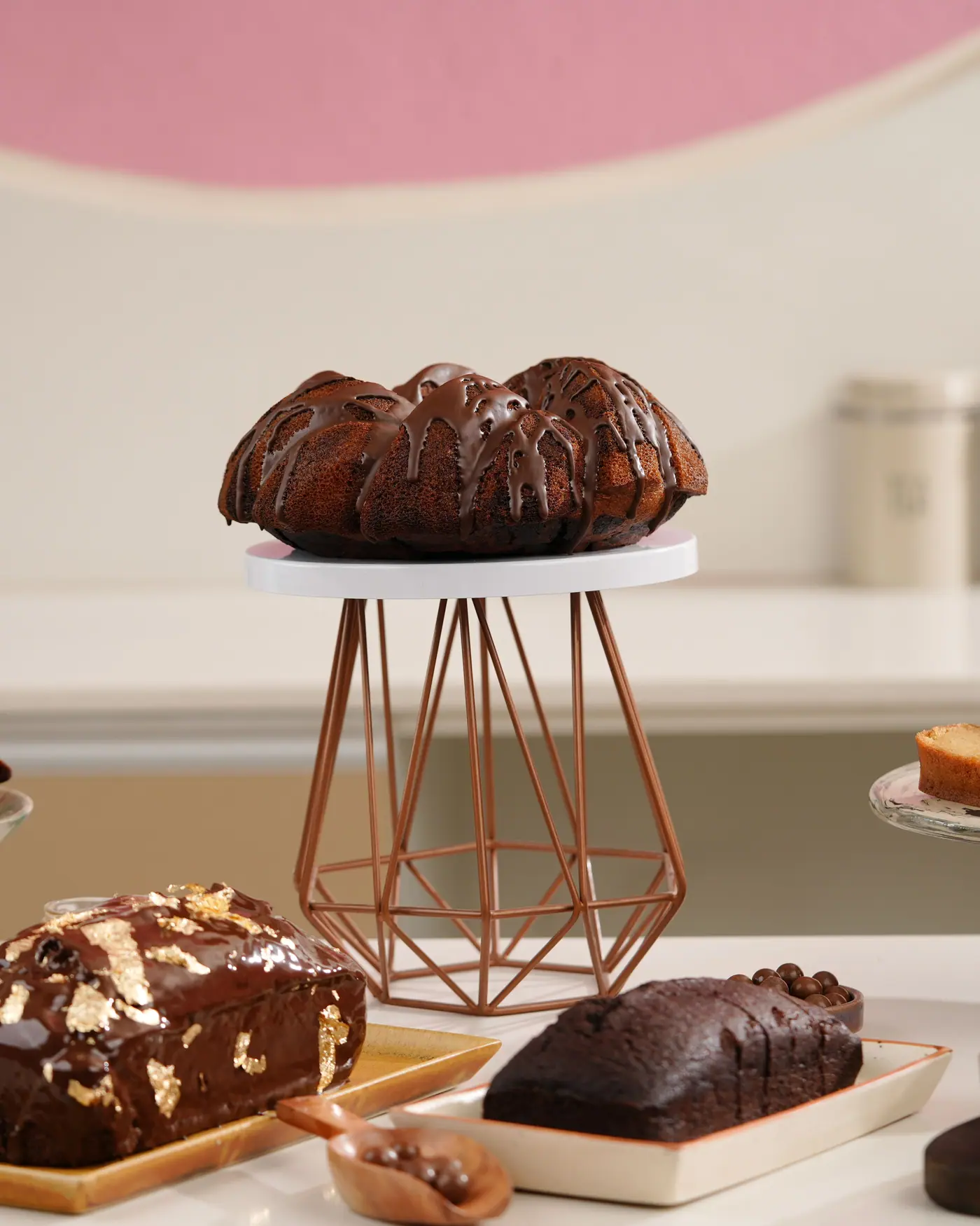 Tea cakes and a glazed bundt on the studio counter